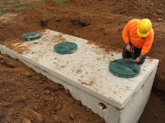 Collingwood septic system professionals installing a septic tank system